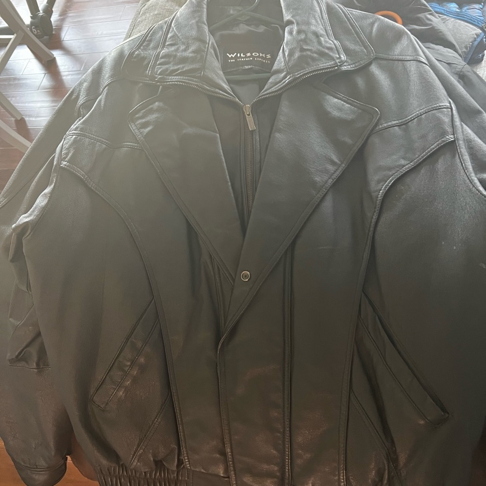 Wilson’s black leather bomber jacket. One minor rub, left side where arm covers